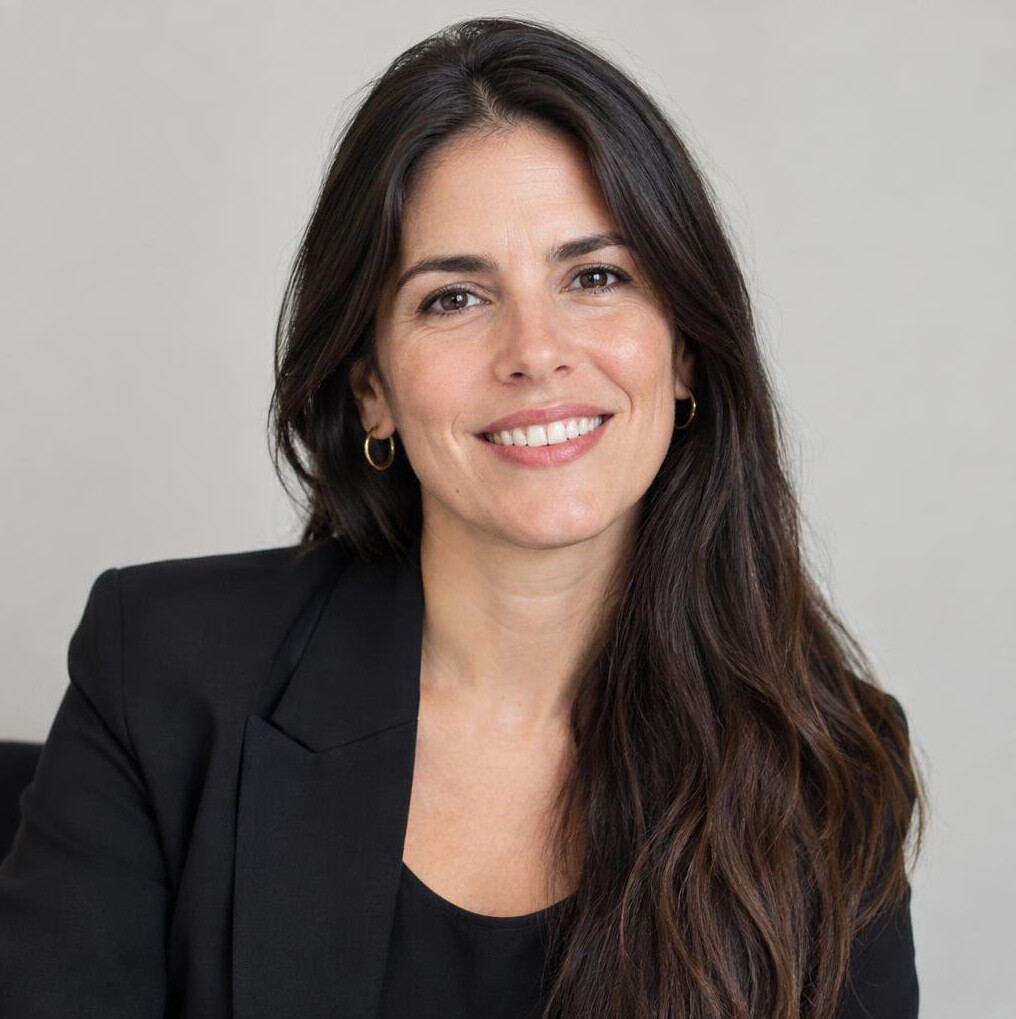 Portrait of a smiling woman with long dark hair