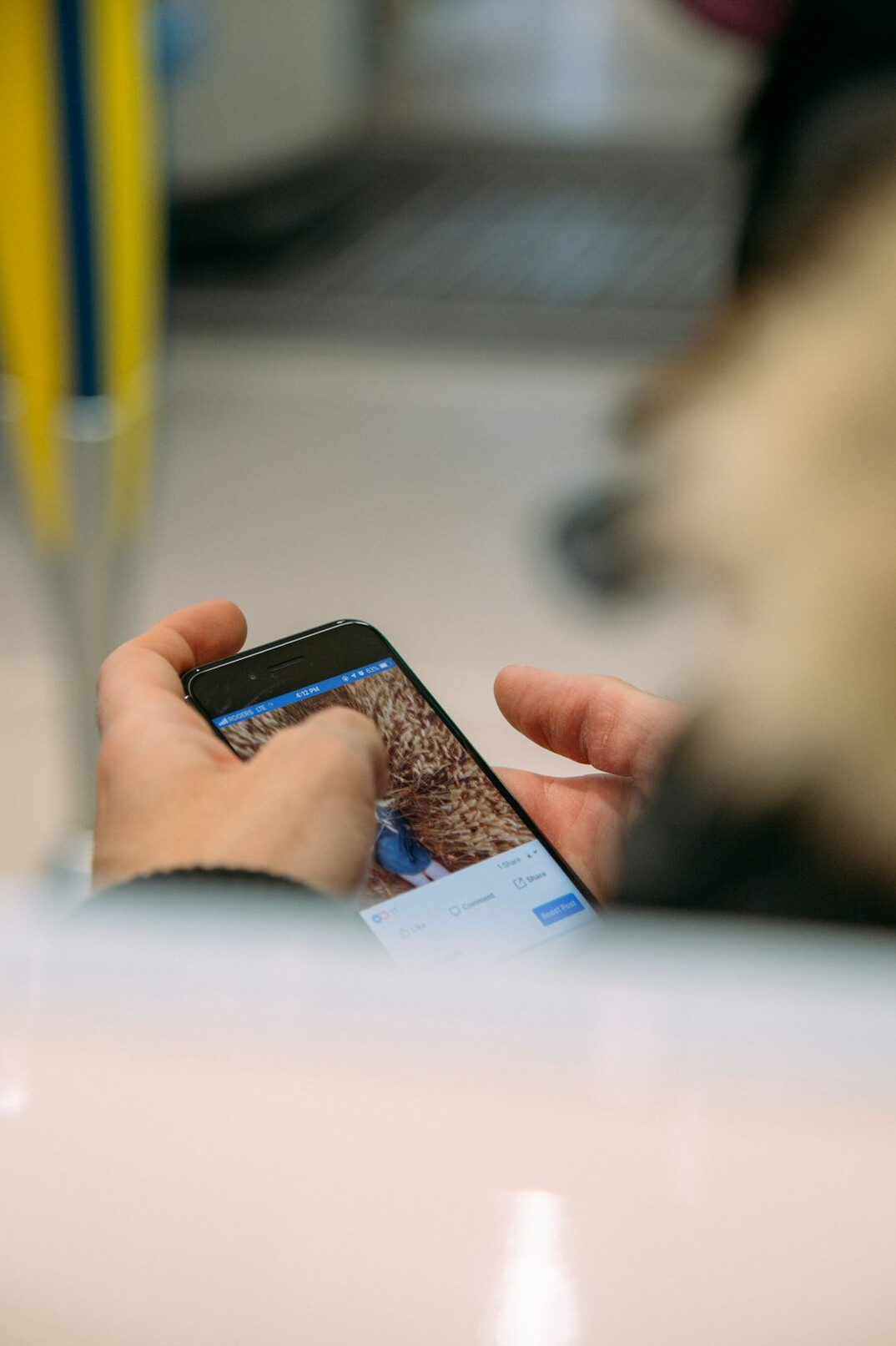Person reading news on a smartphone